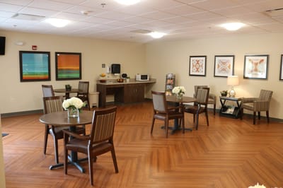 Bright common area with tables and chairs