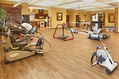 Fitness equipment in a bright exercise room