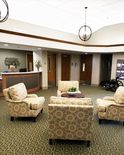 Interior common area with seating and reception desk