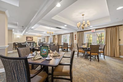 Welcoming dining room with tables set for meals