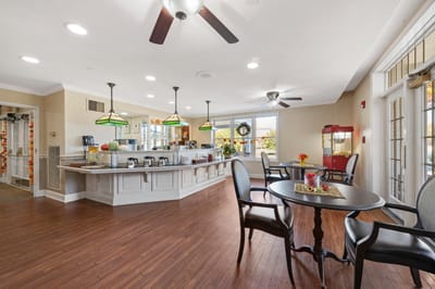 Bright dining area with tables and chairs
