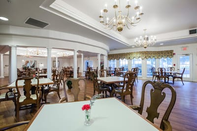 Bright dining room with elegant decor and tables