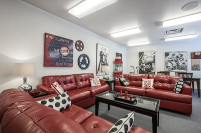 Interior common area with red seating and decor