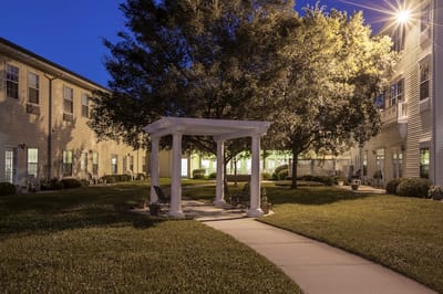 Outdoor garden area with seating and pathways