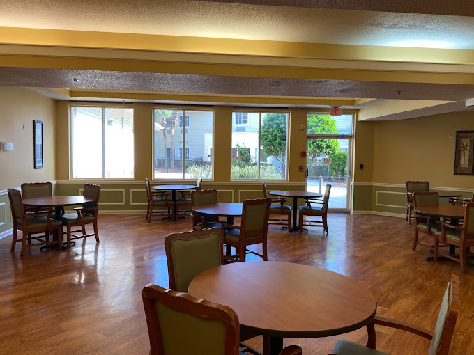 Bright interior common area with tables and chairs