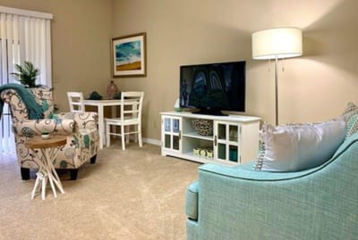Cozy common area with comfortable seating and a TV