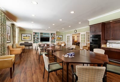 Bright multi-purpose room with tables and chairs