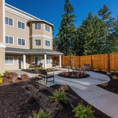 Outdoor seating area with landscaped garden