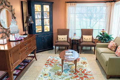 Cozy common area with seating and decorative elements