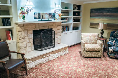 Cozy common area with a fireplace and seating