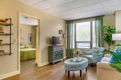 Brightly decorated living area with cozy seating