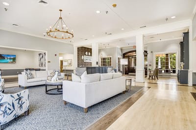 Bright common area with seating and decor