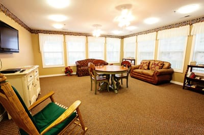 Cozy common area with seating and a table
