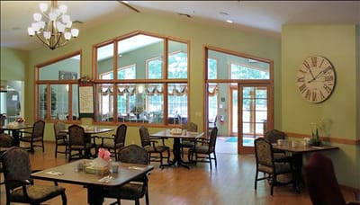 Bright dining room with tables and chairs