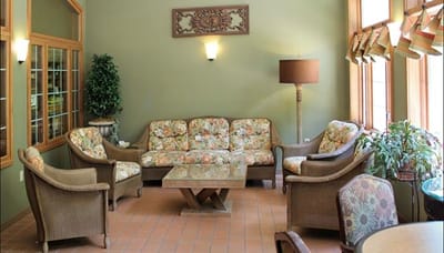 Cozy common area with floral furniture