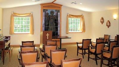 Interior view of a quiet chapel space with chairs