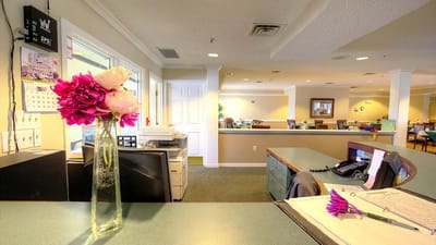 Interior view of the reception area with flowers