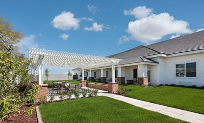 Outdoor space with seating and landscaped area
