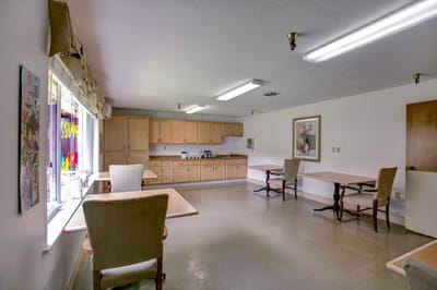 Interior common area with kitchen and seating
