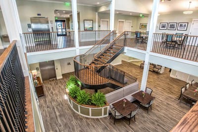 Interior view of a spacious common area with stairs