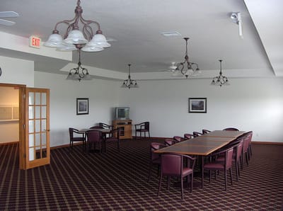Interior view of a common area with tables and chairs