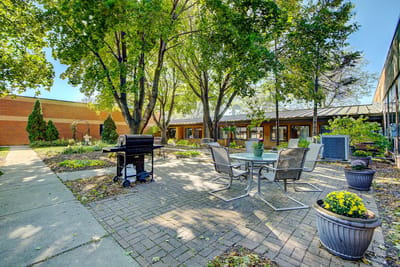 Outdoor garden area with seating and landscaping