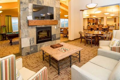 Interior common area with seating and fireplace