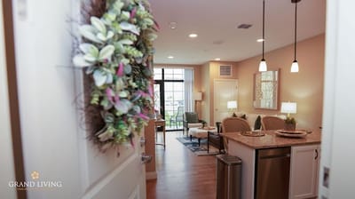 Bright, welcoming view of a senior living apartment interior