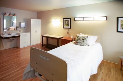 Bright private resident room with wooden floor