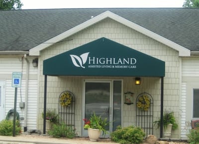 Exterior signage for Highland Assisted Living & Memory Care