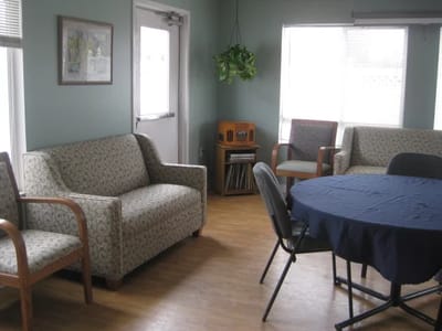 Comfortable common area with seating and natural light