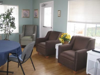 Cozy common area with seating and natural light