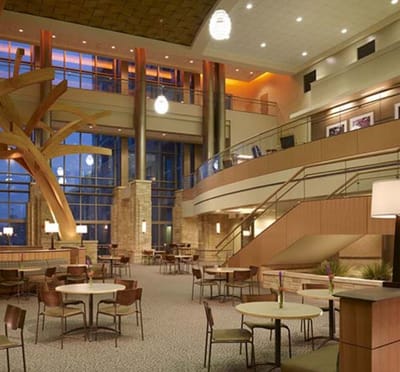Spacious common area with seating and decorative wood structure