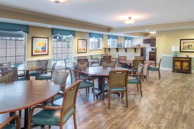 Bright dining area with tables and chairs
