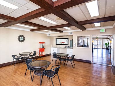 Common area with seating and a popcorn machine