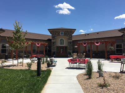 Outdoor courtyard area with tables and seating