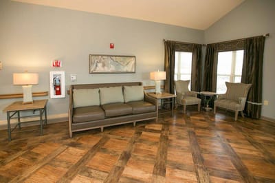 A cozy interior lobby with seating and decor