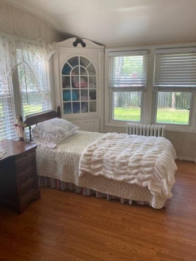 Cozy resident room with natural light and wooden furniture