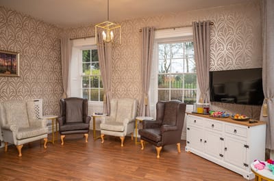 Cozy common area with seating and refreshments