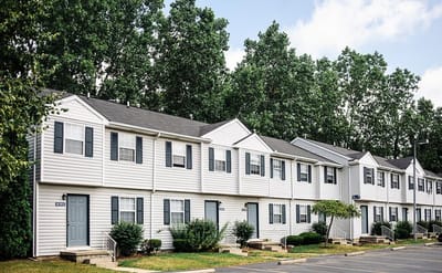Exterior view of a residential building with greenery