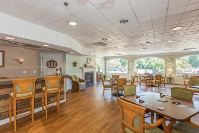 Bright common area with tables and seating
