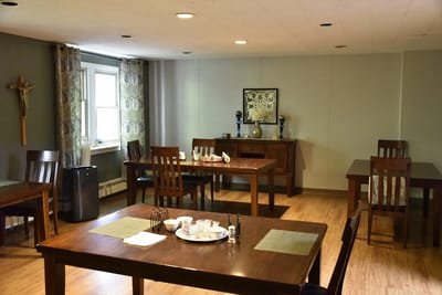 Interior common area with tables and chairs