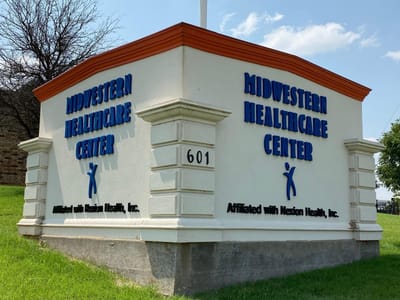 Exterior view of Nexion Midwestern Healthcare Center sign