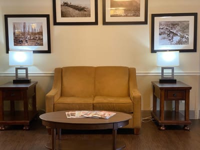Cozy common area with seating and lamps