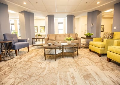 Bright common area with seating and decor