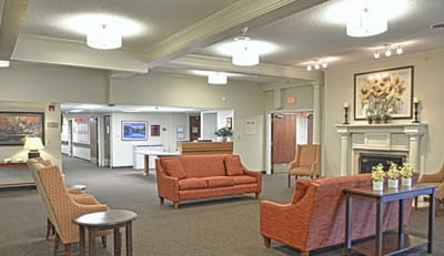Common area with seating and artwork in the facility