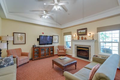 Interior common area with seating and fireplace