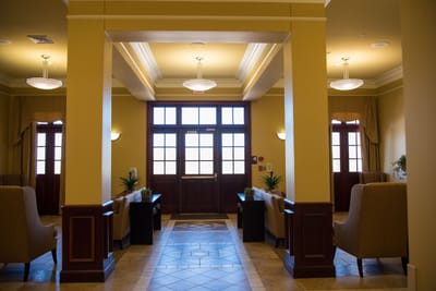 Interior of a common area with seating and natural light
