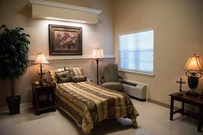 Cozy resident room with warm lighting and decor