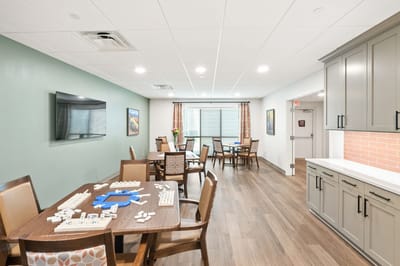 Bright common area for activities with game tables